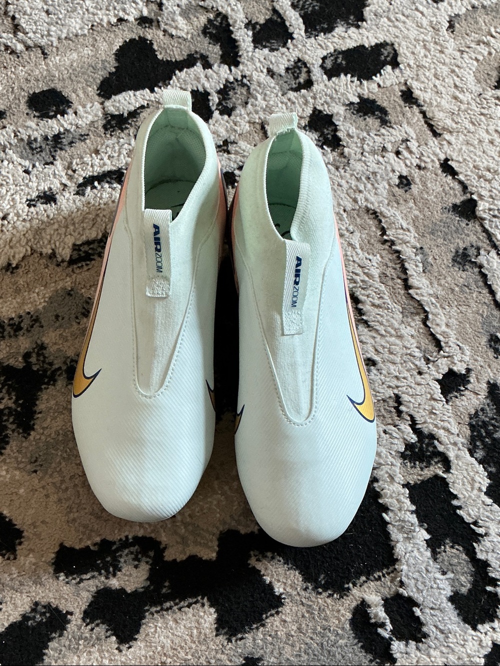 Nike Kids White Slip-On Sneakers with Yellow Swoosh